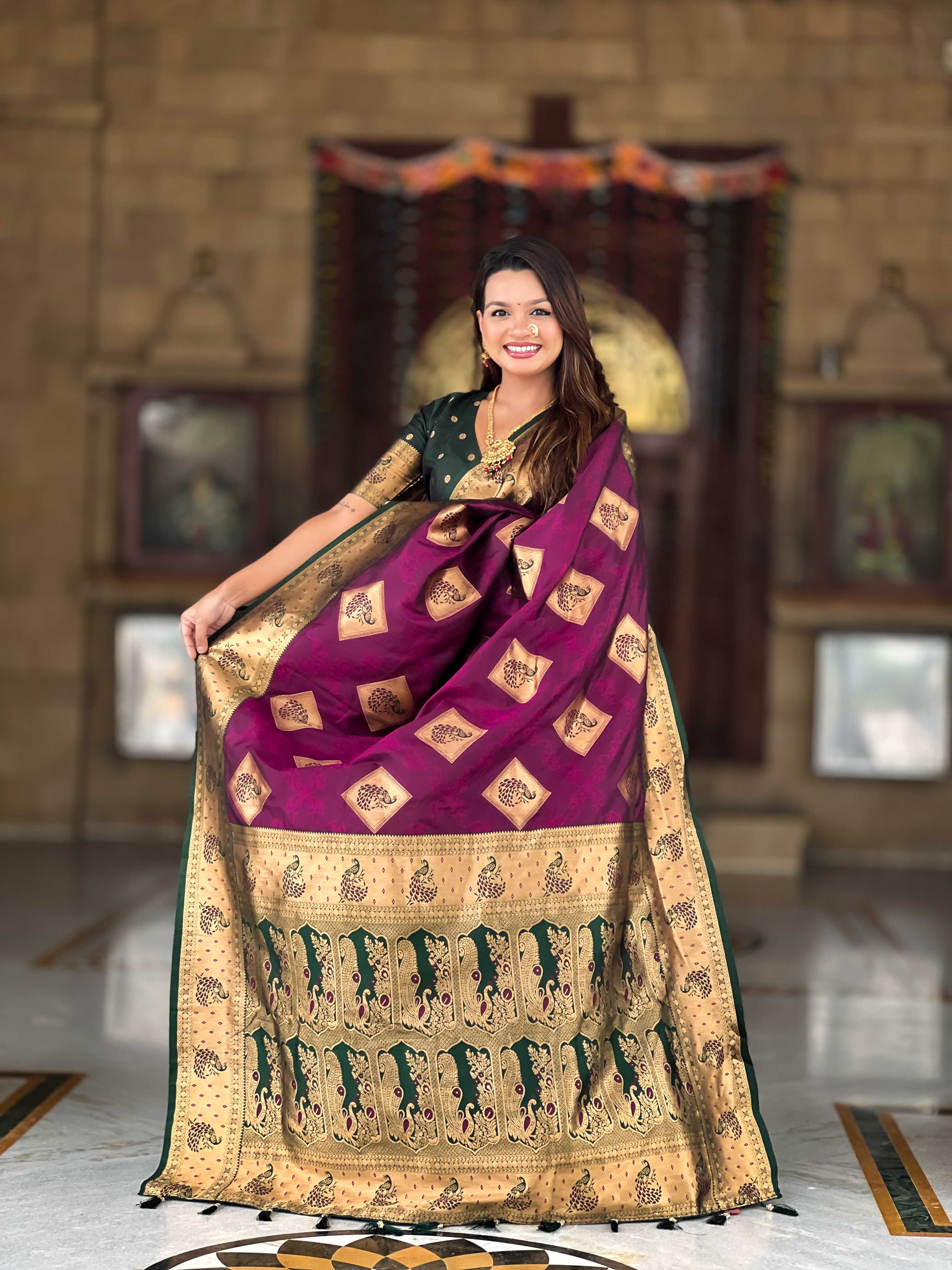 Wine Soft Banarasi silk saree with zari weaving Meenakari design all over the saree & contrast weawing Rich pallu with contrast weawing border & tessels attached at Pallu End. Blouse :- Soft silk weawing blouse piece