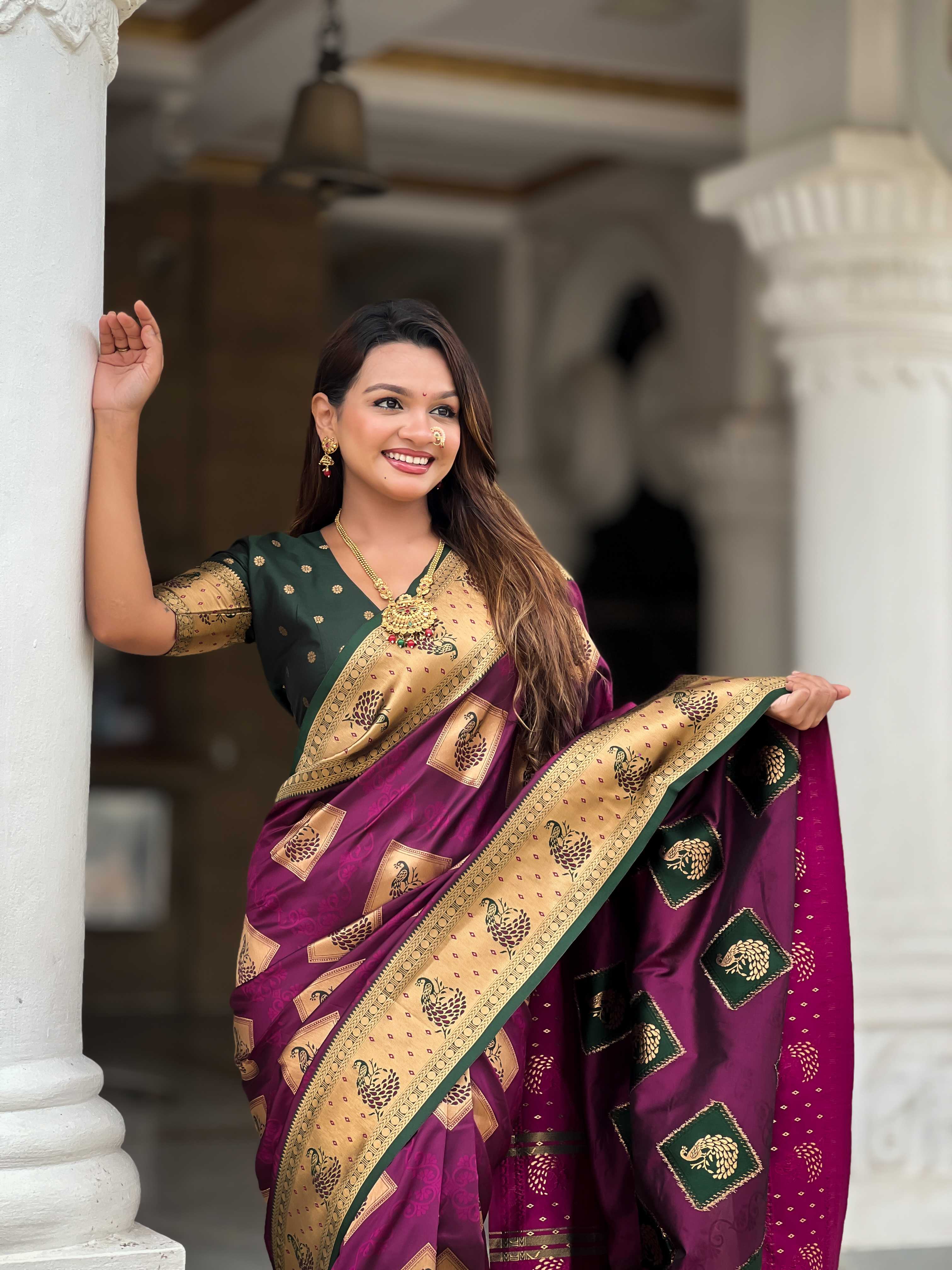 Wine Soft Banarasi silk saree with zari weaving Meenakari design all over the saree & contrast weawing Rich pallu with contrast weawing border & tessels attached at Pallu End. Blouse :- Soft silk weawing blouse piece