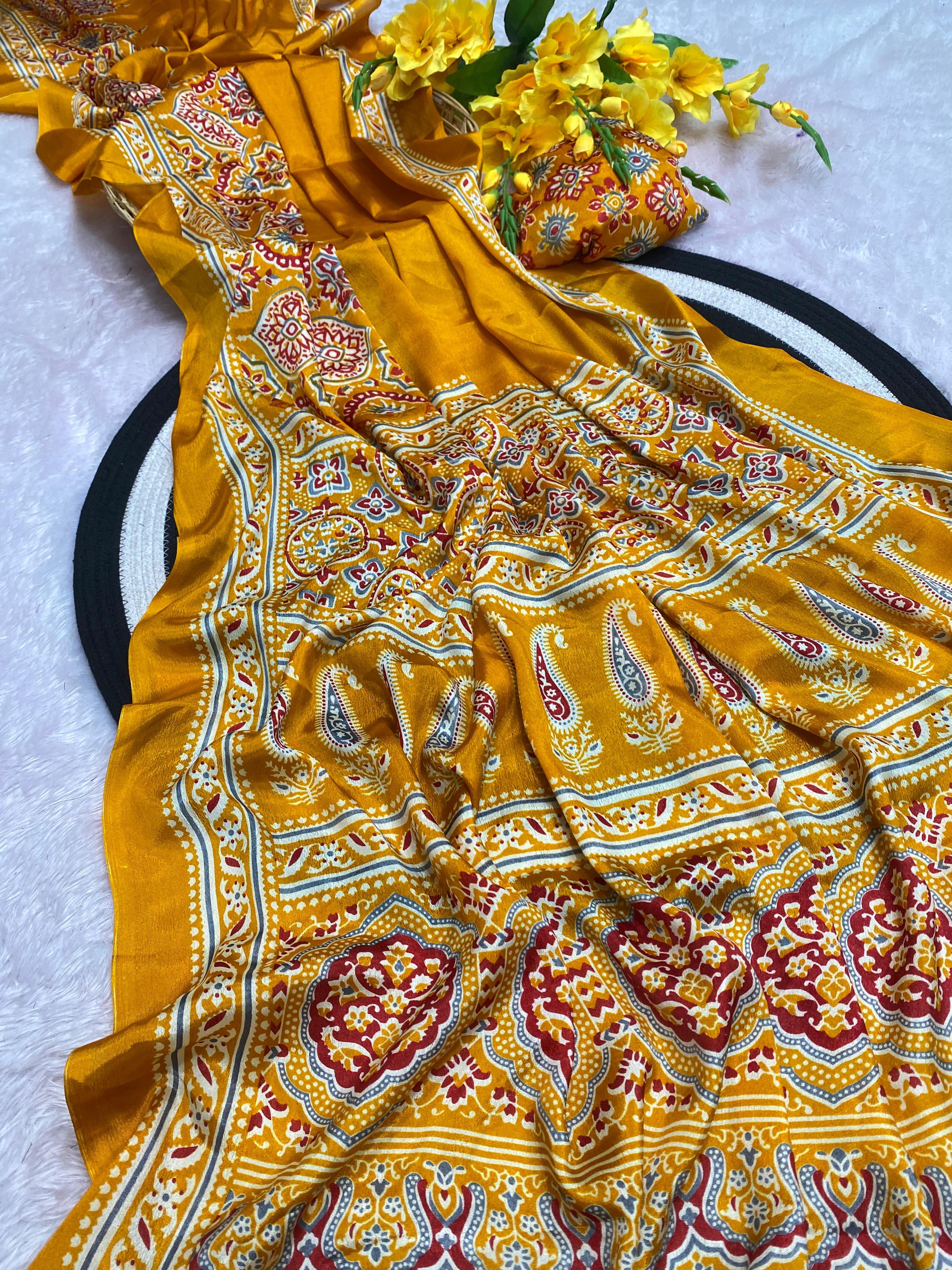 Bhandani Print Moss chiffon Yellow saree with mirror work Border