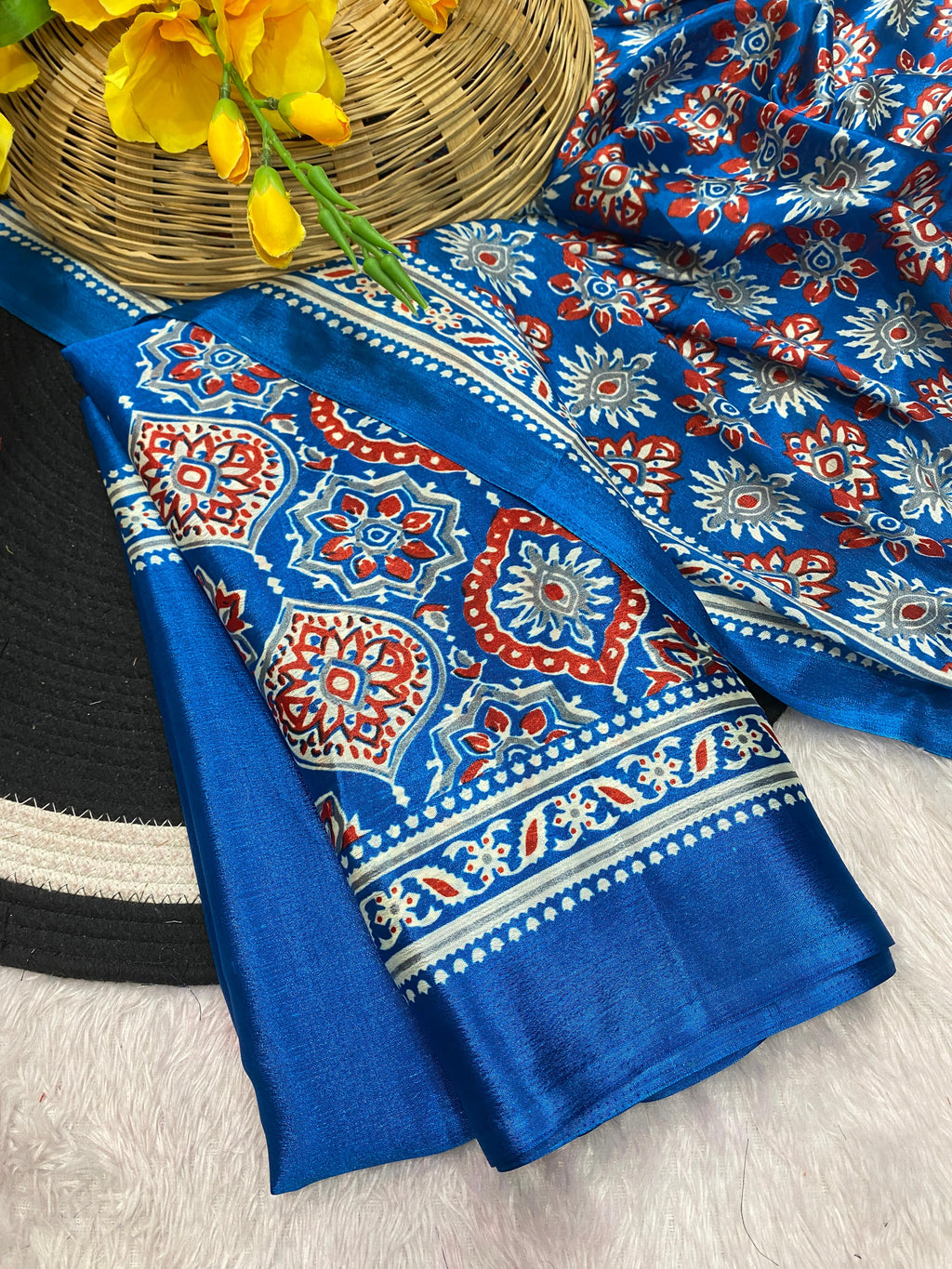 Bhandani Print Moss chiffon Blue saree with mirror work Border