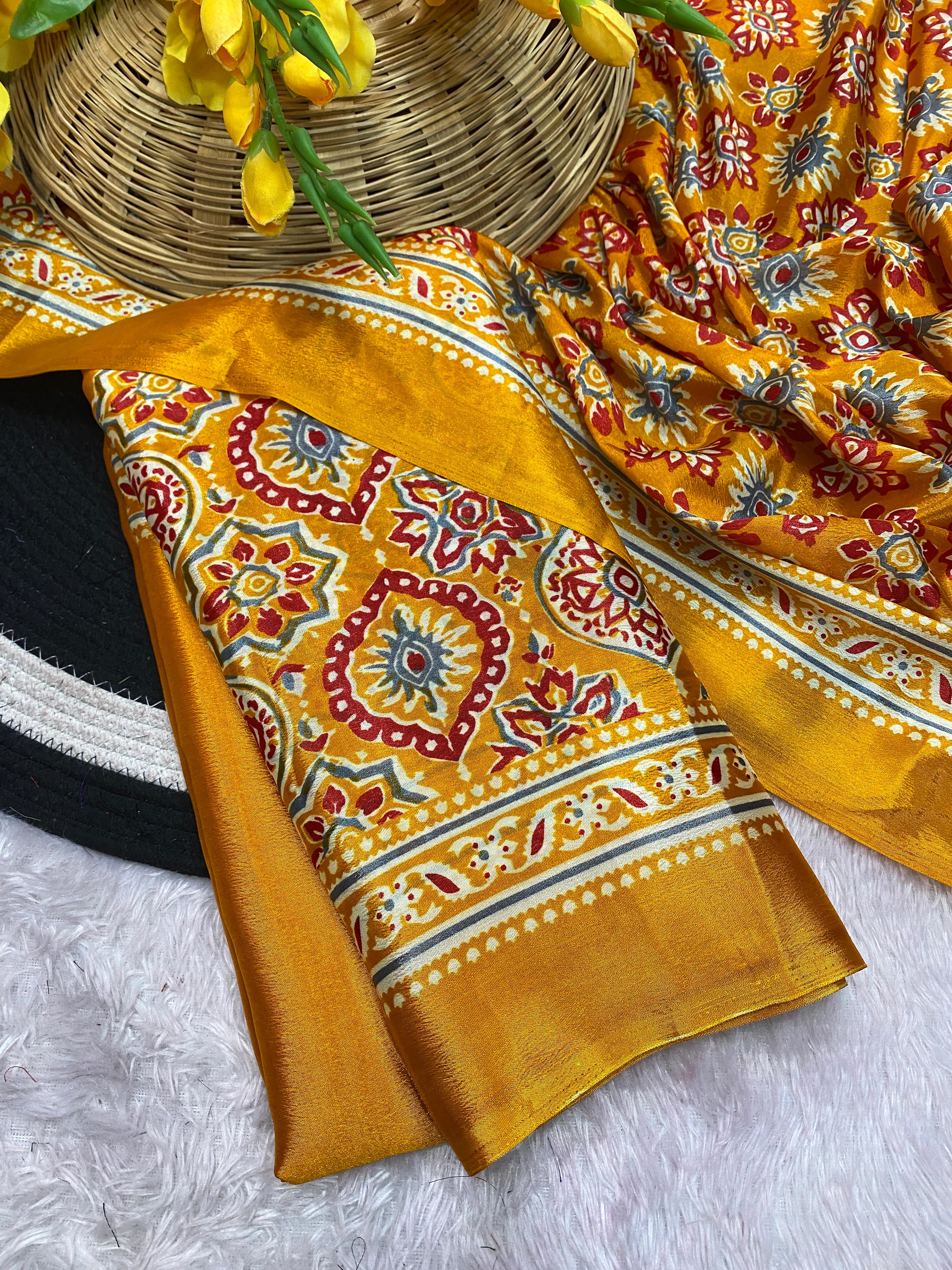 Bhandani Print Moss chiffon Yellow saree with mirror work Border