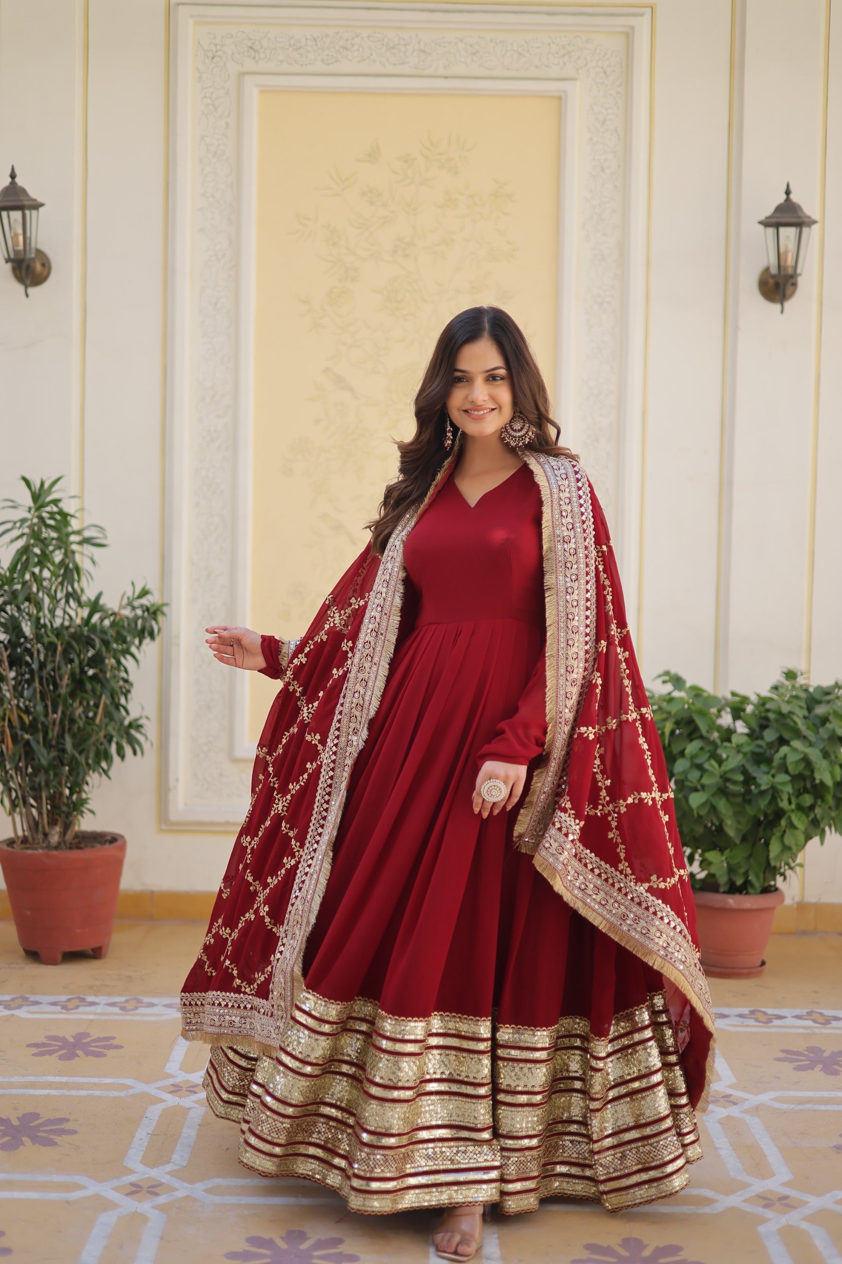 Maroon Faux Blooming Gown with Embroidery, Zari & Sequins Work – Elegant Ethnic Wear