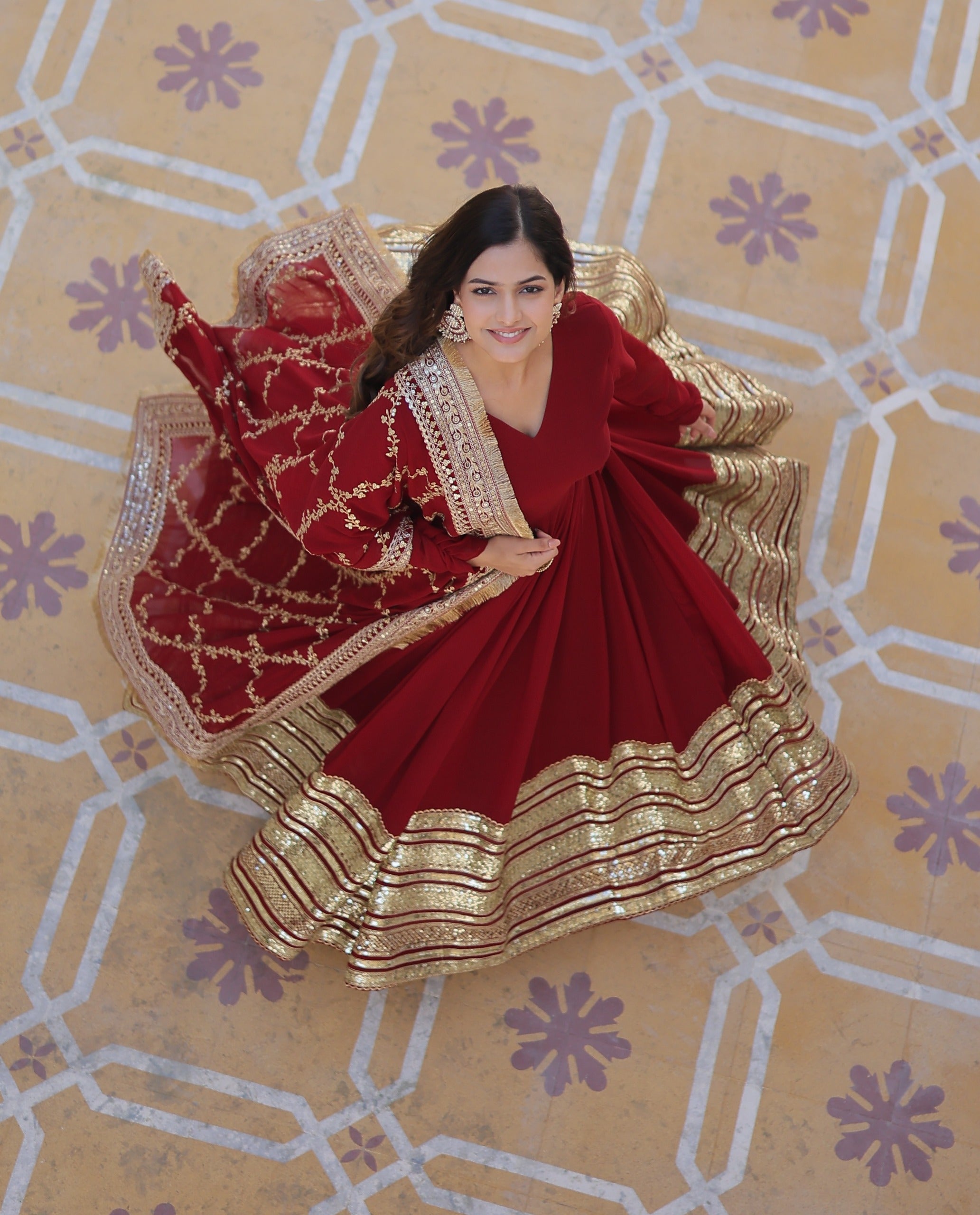 Maroon Faux Blooming Gown with Embroidery, Zari & Sequins Work – Elegant Ethnic Wear