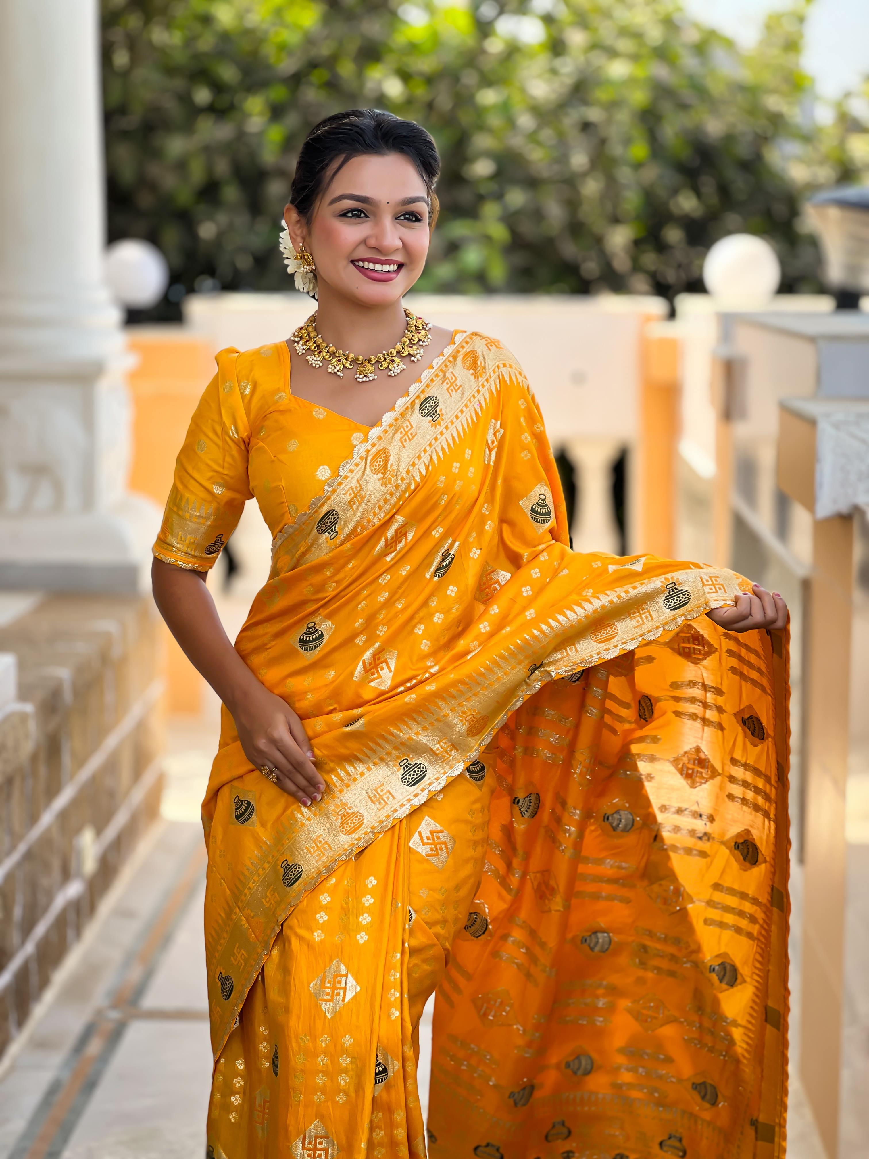 Yellow Varni Fabrics Women Floral Dolla Silk Tassels and Latkans Saree comes With Matching Blouse