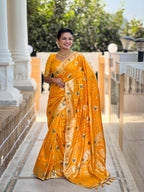 Yellow Varni Fabrics Women Floral Dolla Silk Tassels and Latkans Saree comes With Matching Blouse