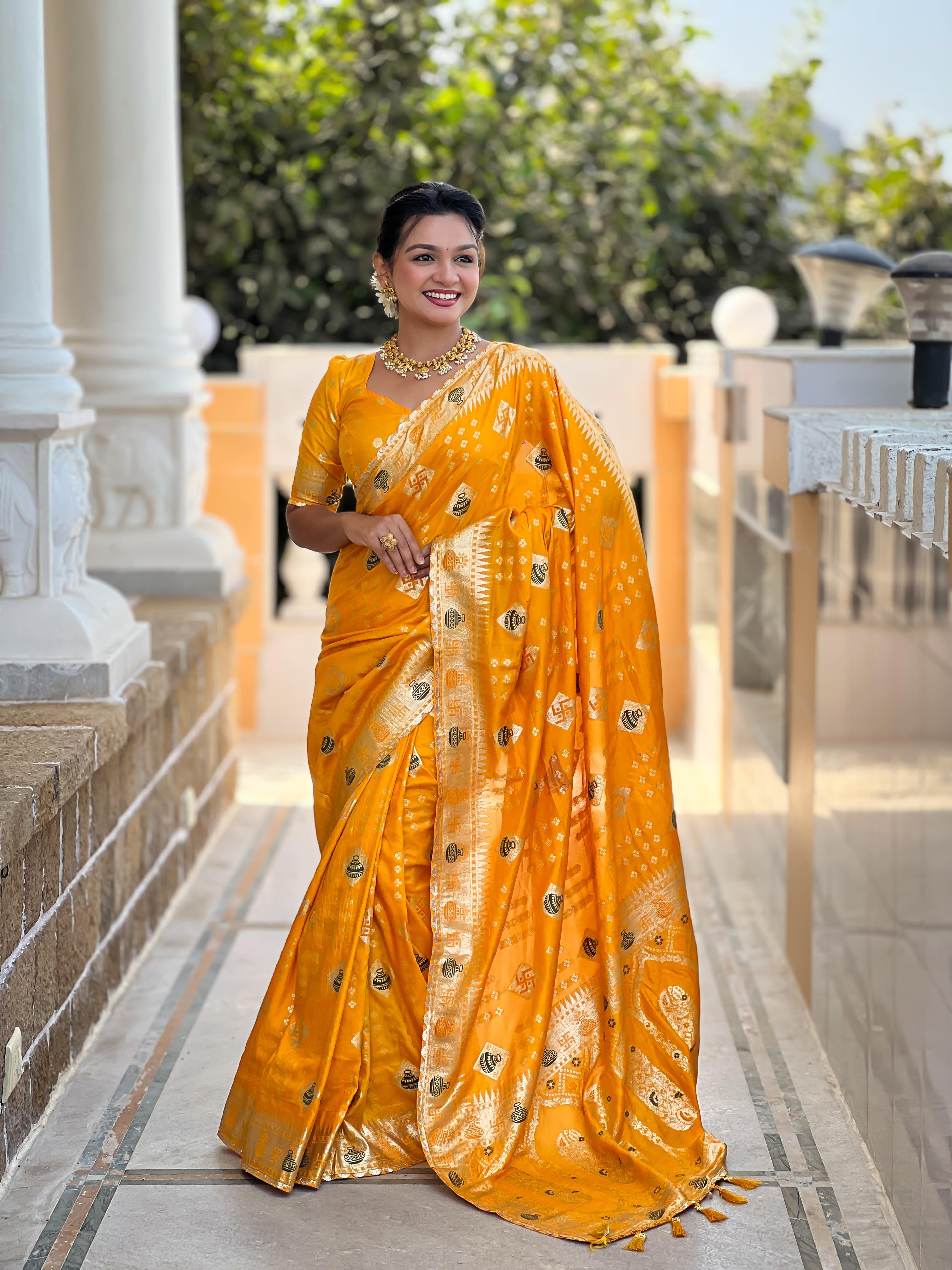 Yellow Varni Fabrics Women Floral Dolla Silk Tassels and Latkans Saree comes With Matching Blouse