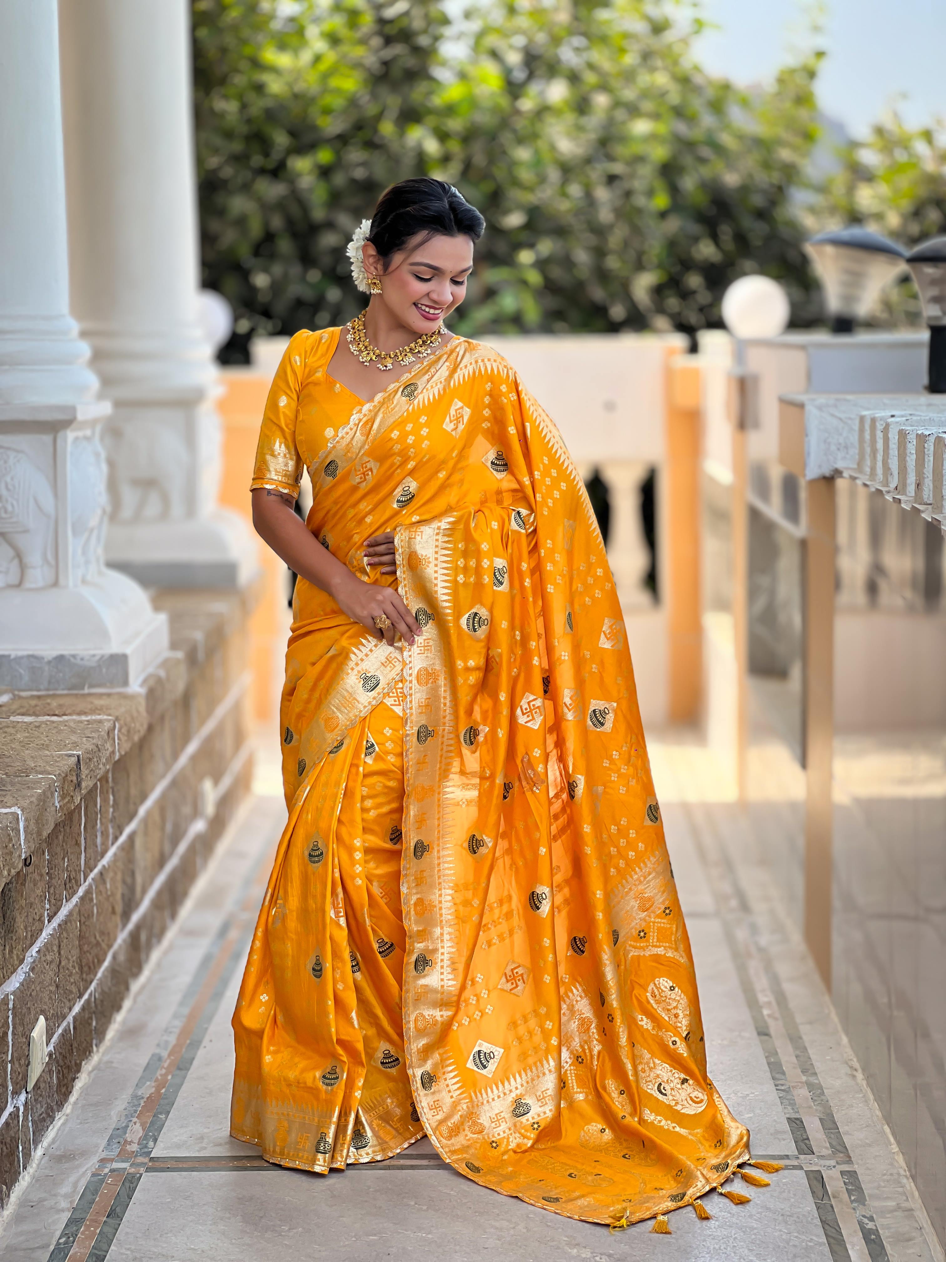 Yellow Varni Fabrics Women Floral Dolla Silk Tassels and Latkans Saree comes With Matching Blouse
