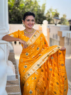Yellow Varni Fabrics Women Floral Dolla Silk Tassels and Latkans Saree comes With Matching Blouse