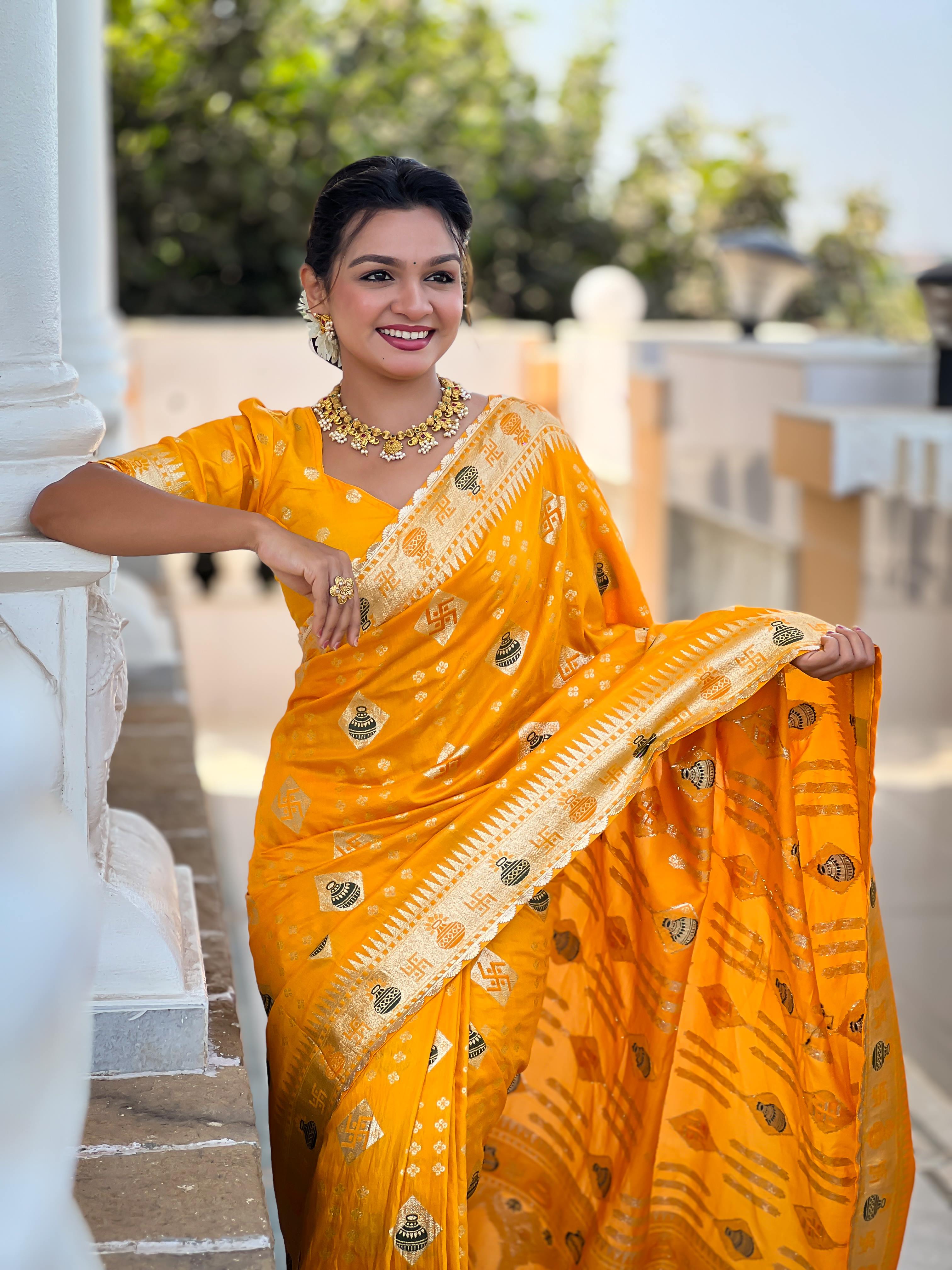 Yellow Varni Fabrics Women Floral Dolla Silk Tassels and Latkans Saree comes With Matching Blouse