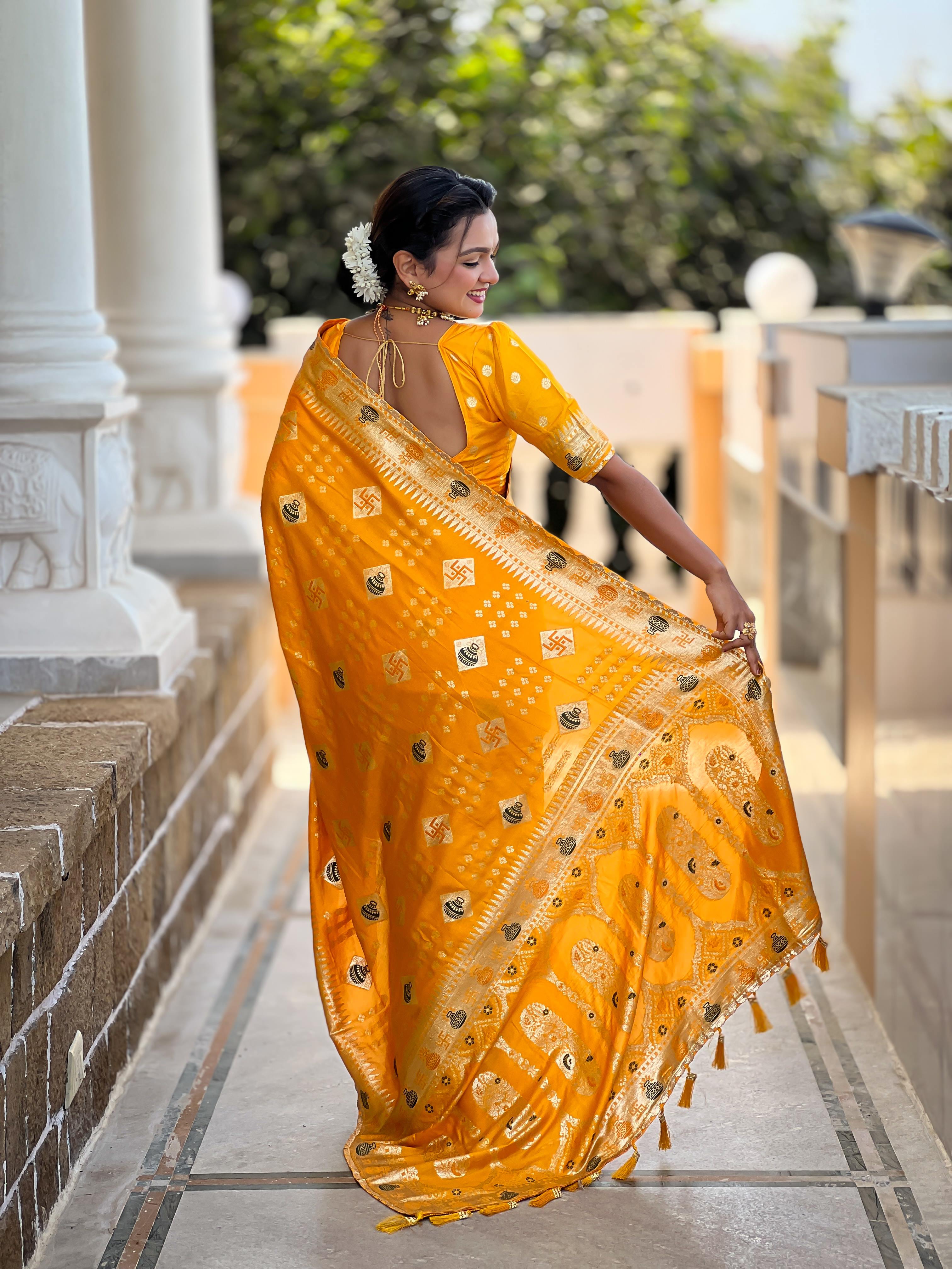 Yellow Varni Fabrics Women Floral Dolla Silk Tassels and Latkans Saree comes With Matching Blouse