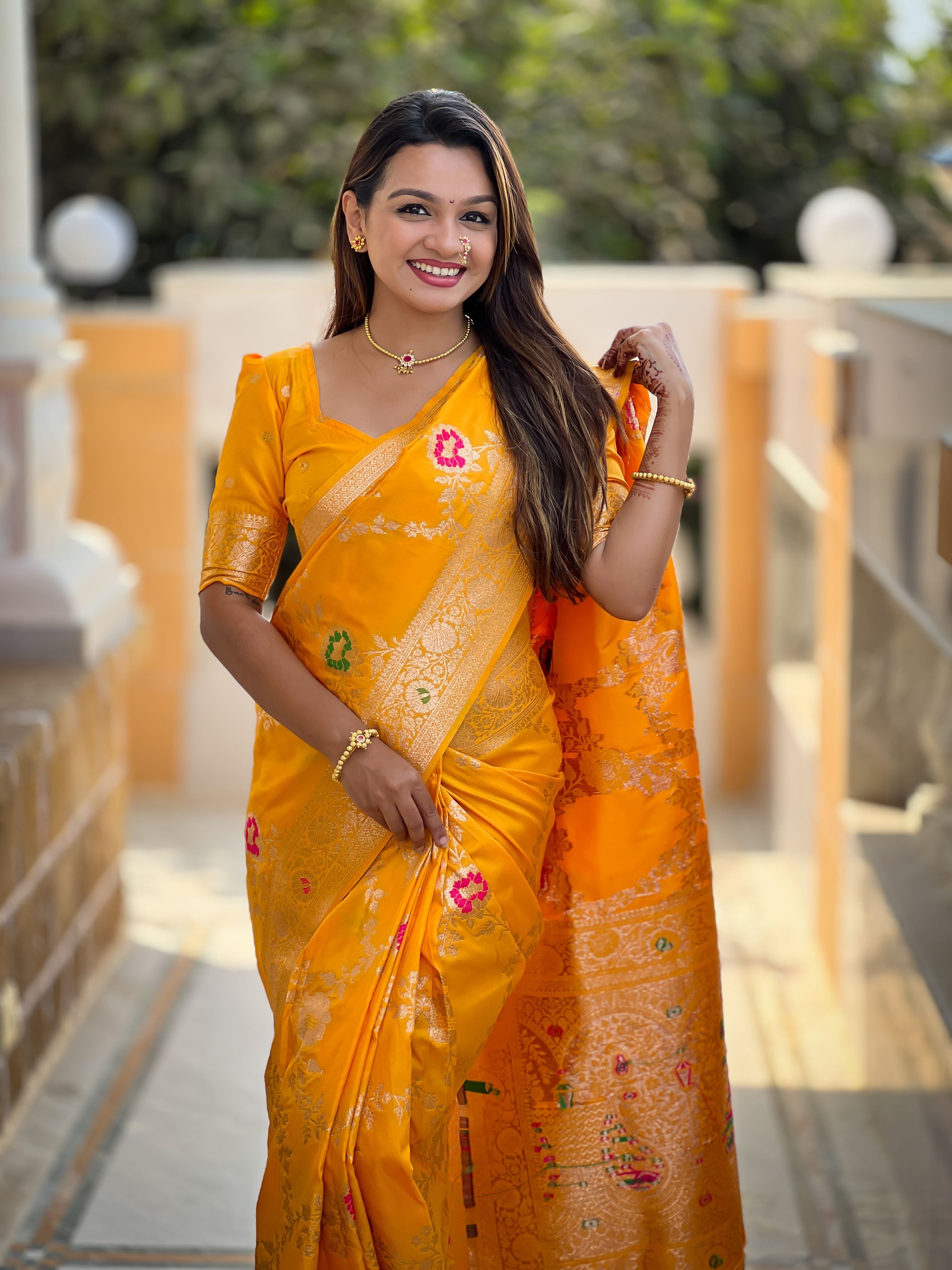 Yellow Varni Fabrics Women Floral Banarasi Silk Woven Saree comes With Matching Blouse