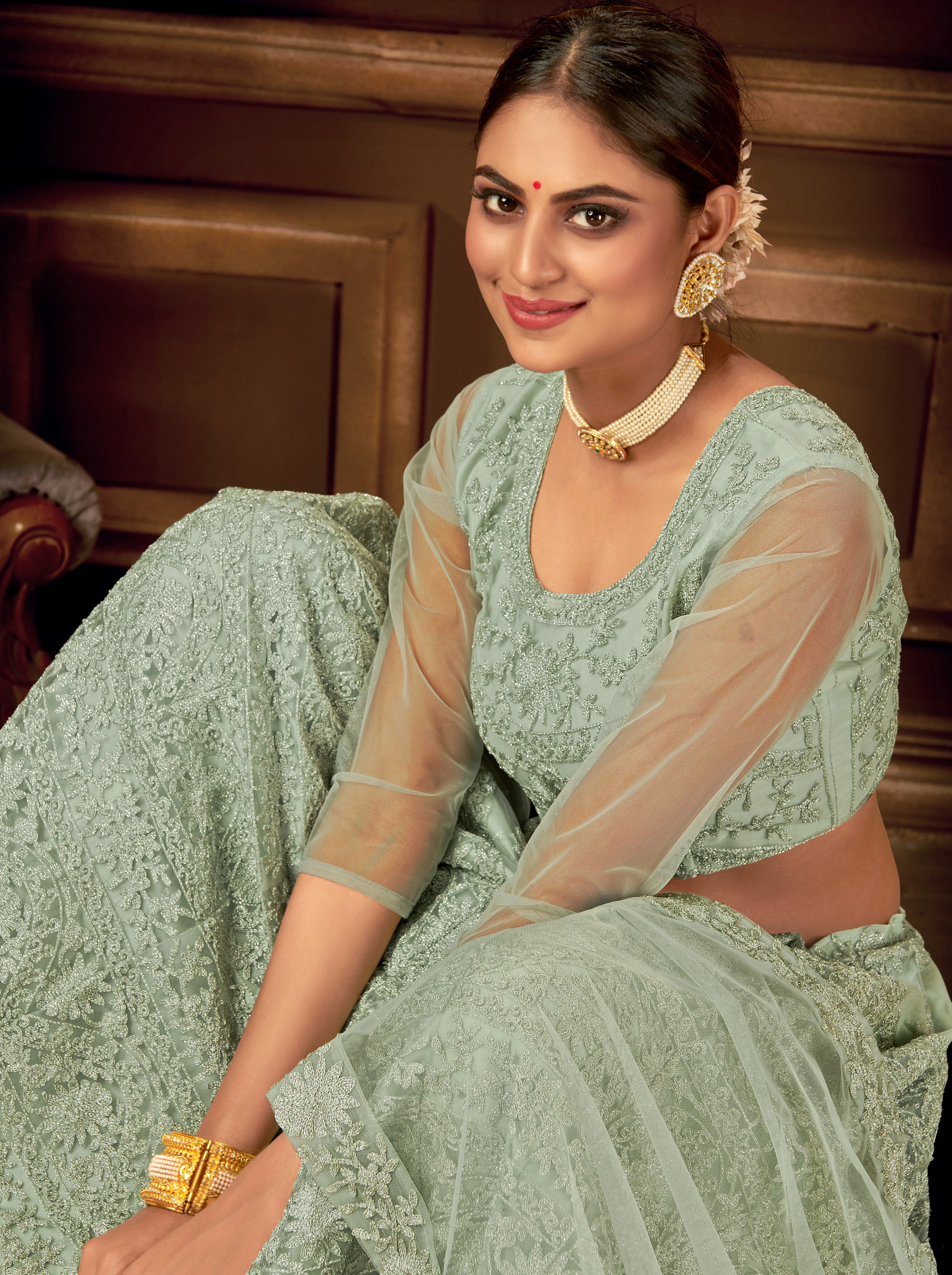 Pista Green Embroidered Net Semi Stitched Lehengha choli