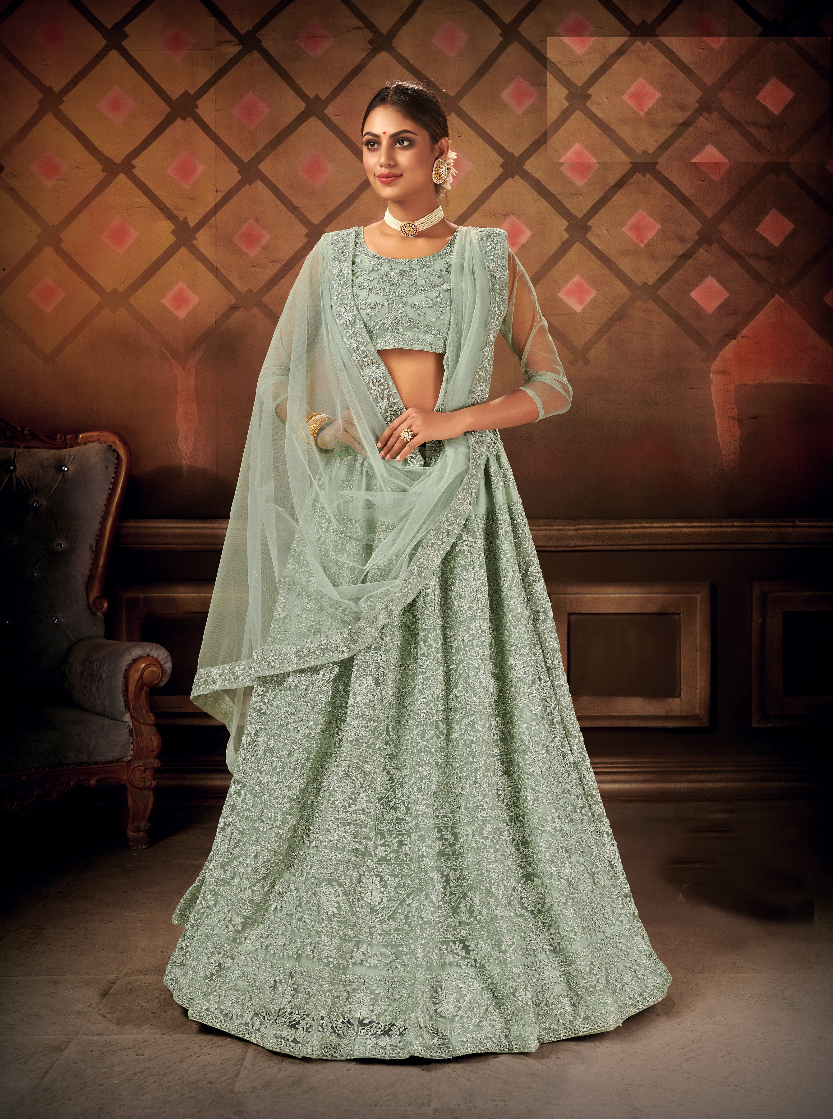 Pista Green Embroidered Net Semi Stitched Lehengha choli