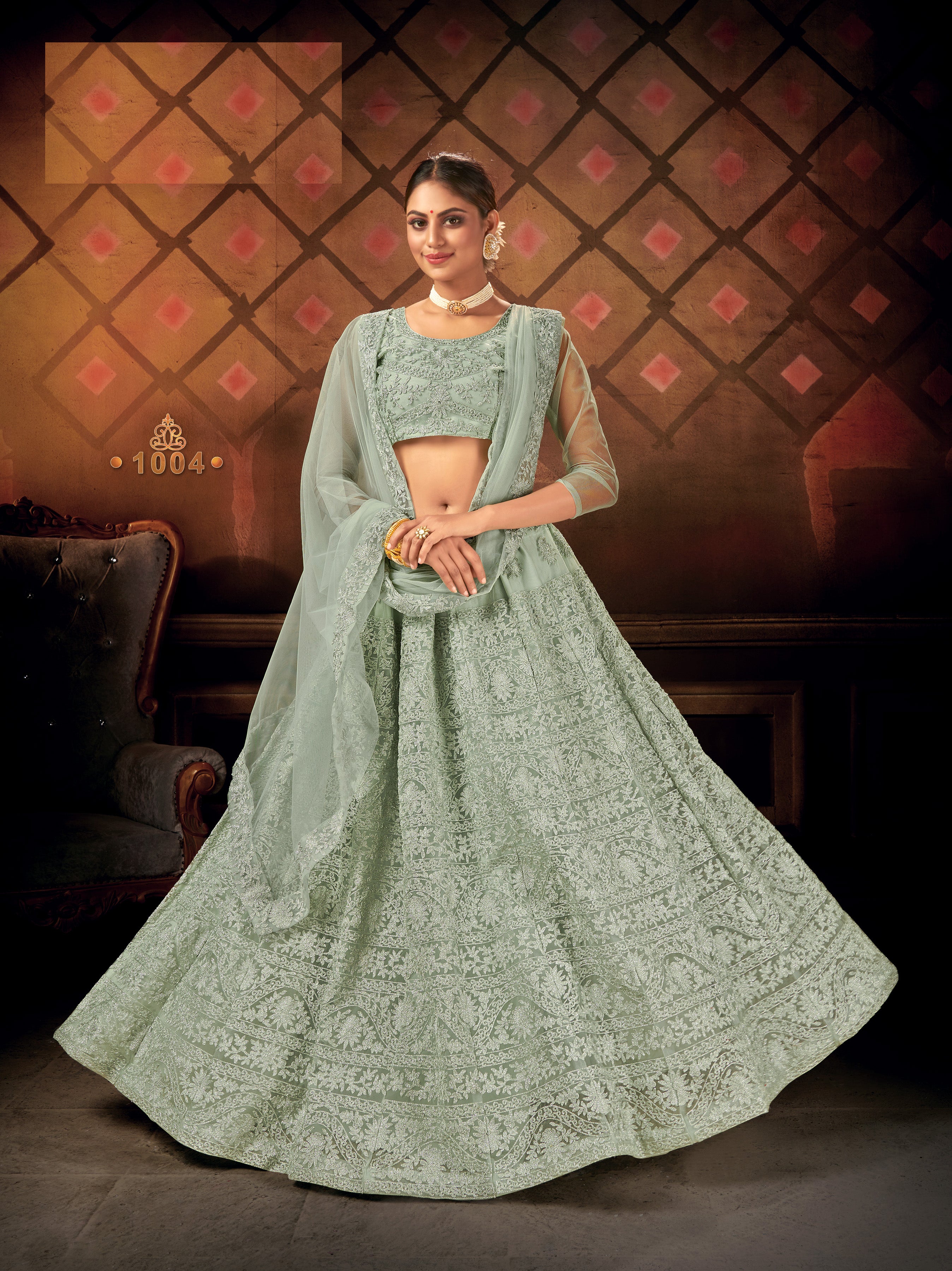 Pista Green Embroidered Net Semi Stitched Lehengha choli