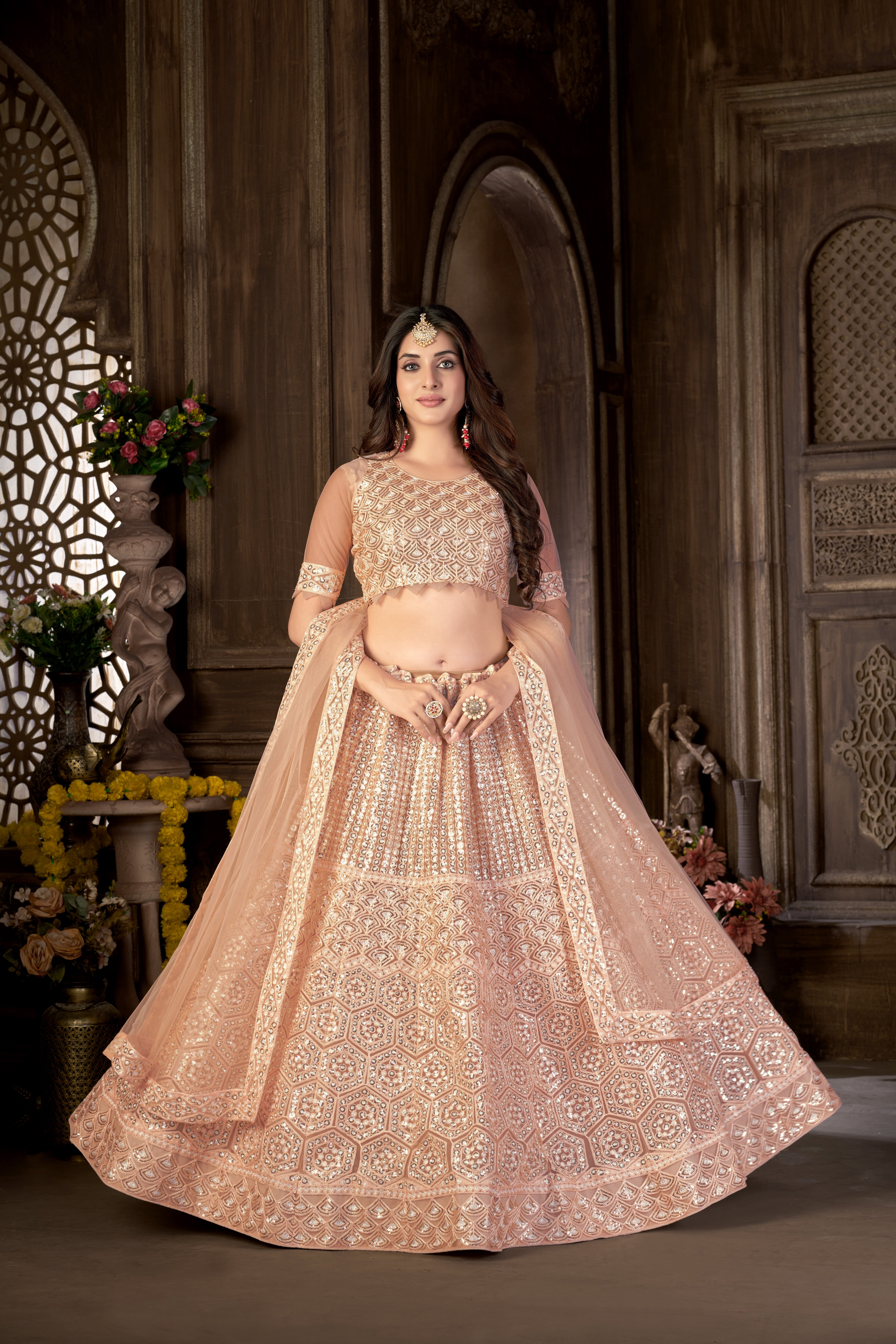 Peach Net with Cancan Heavy Sequence Embroidered Work Semi-Stitched Lehenga Choli