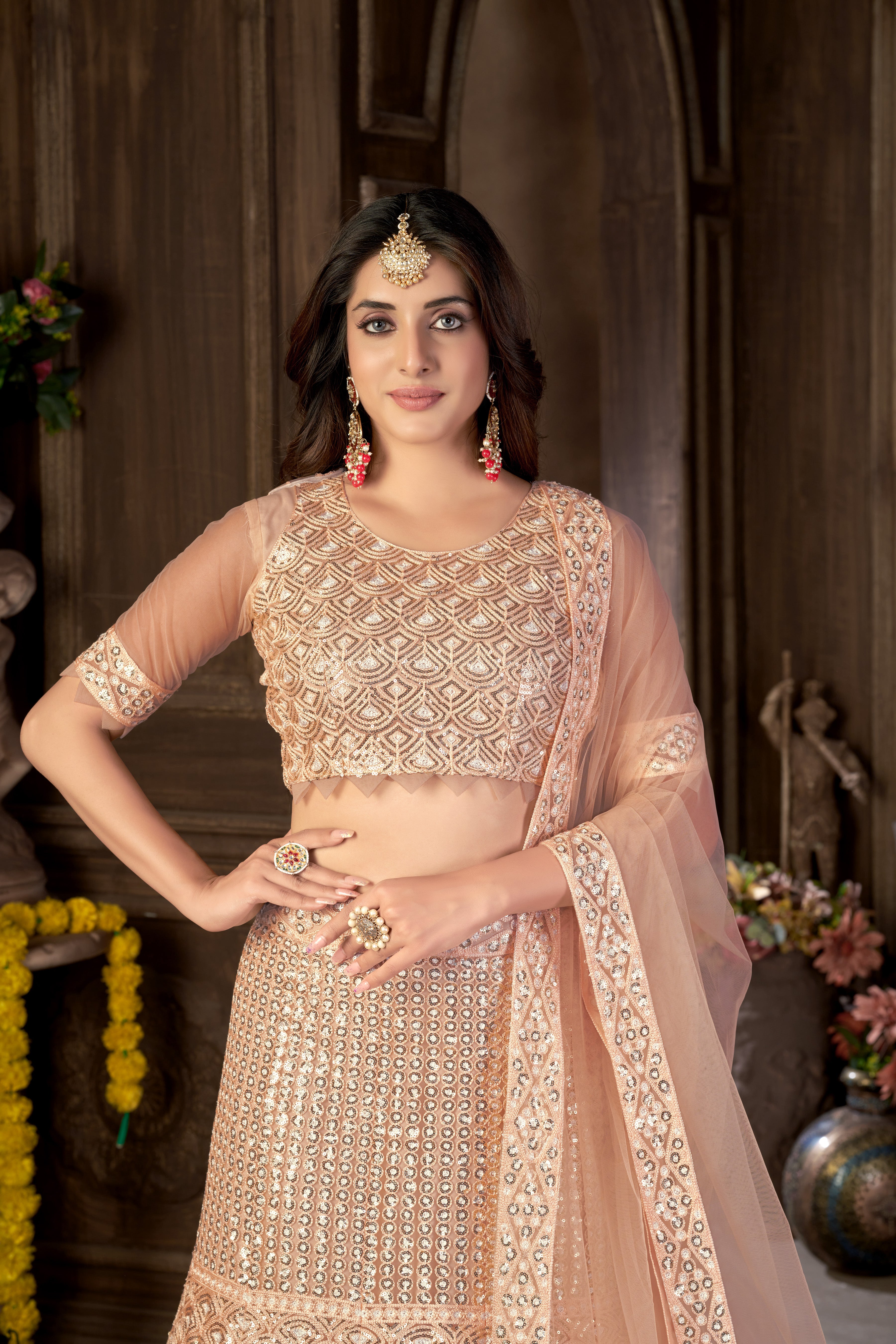Peach Net with Cancan Heavy Sequence Embroidered Work Semi-Stitched Lehenga Choli