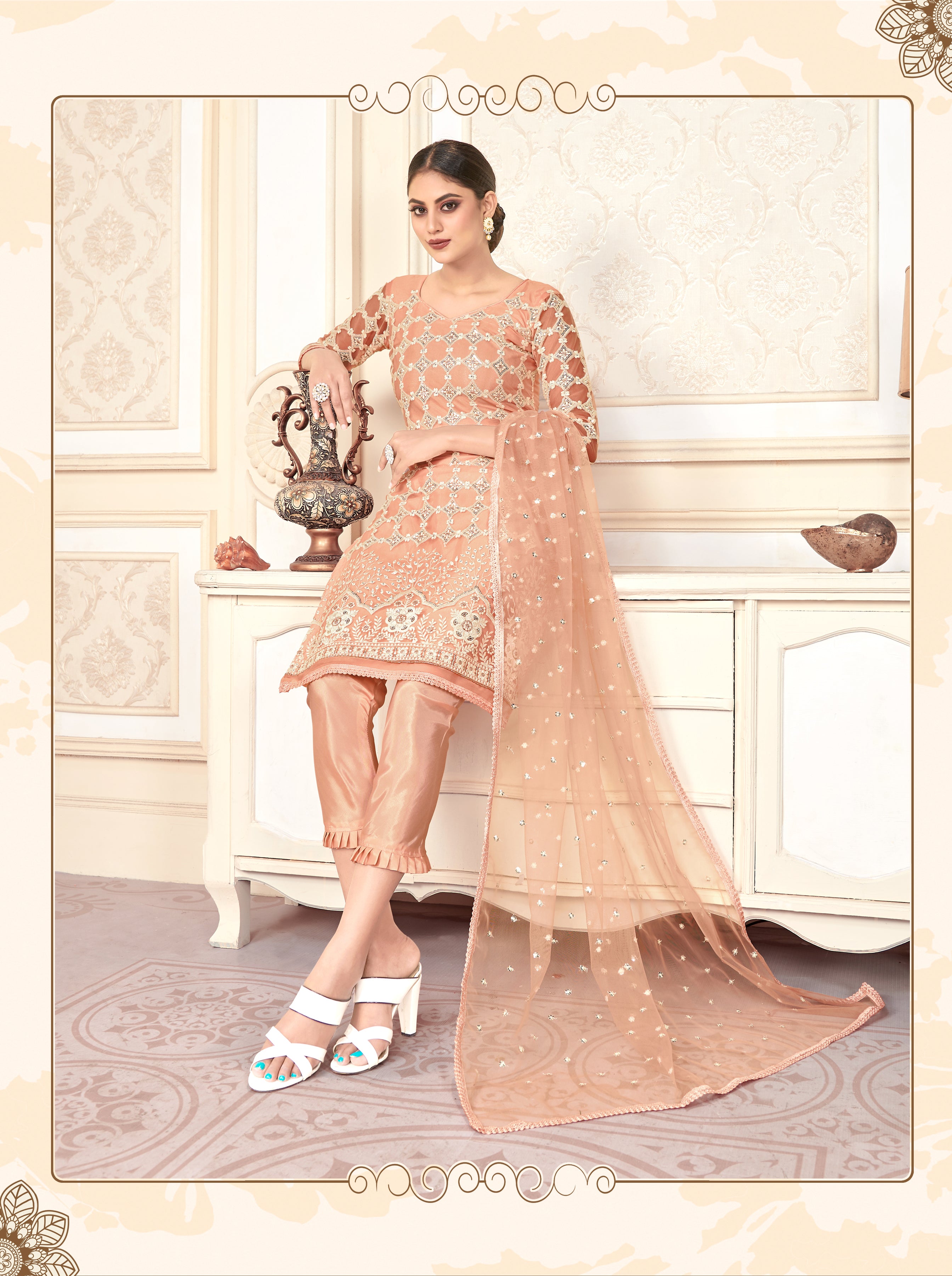 Peach Women Net Heavy Embroidery Work Semi Stitch Dress Material.
