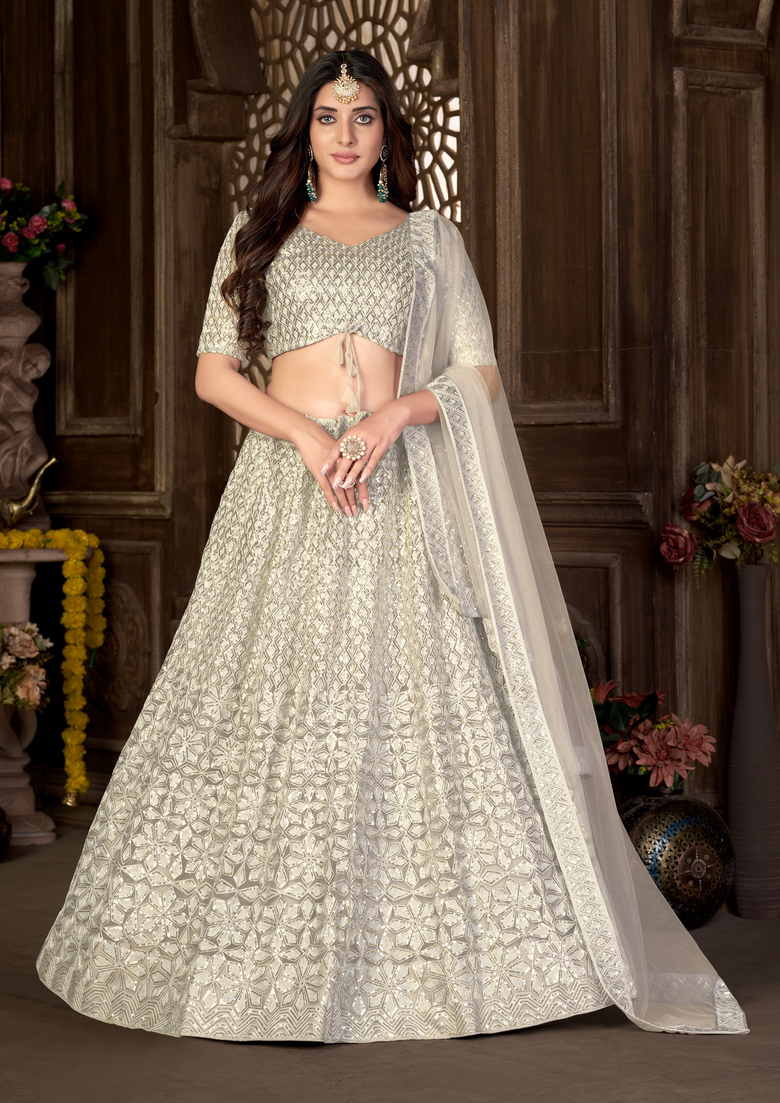 Off White Heavy Net With Sequence Embroidered Work Semi Stitch Lehenga Choli