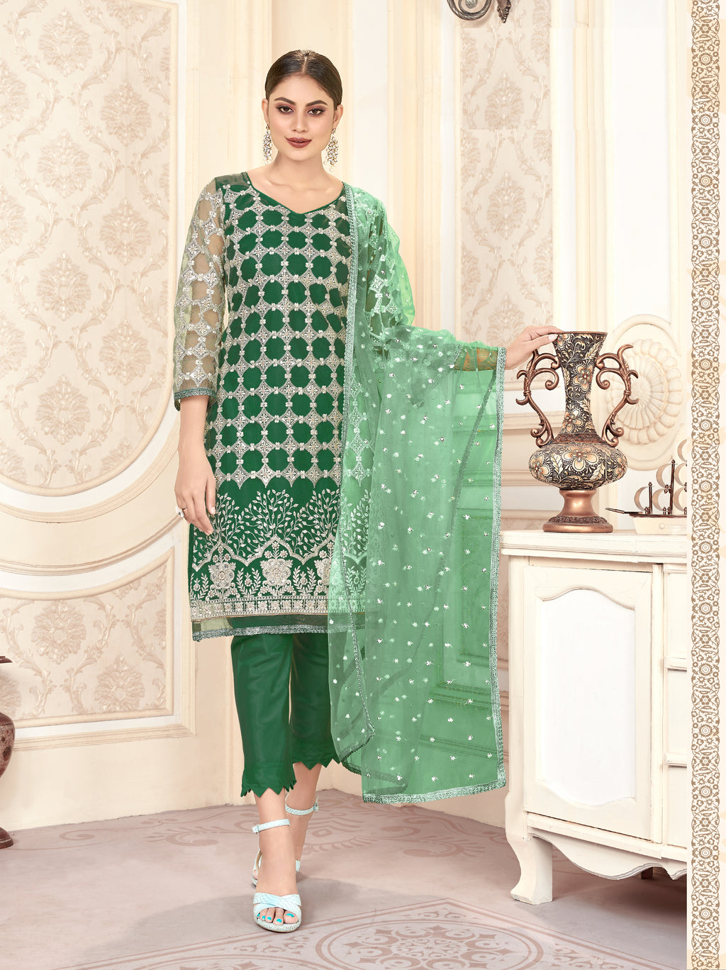 Green Women Net Heavy Embroidery Work Semi Stitch Dress Material.