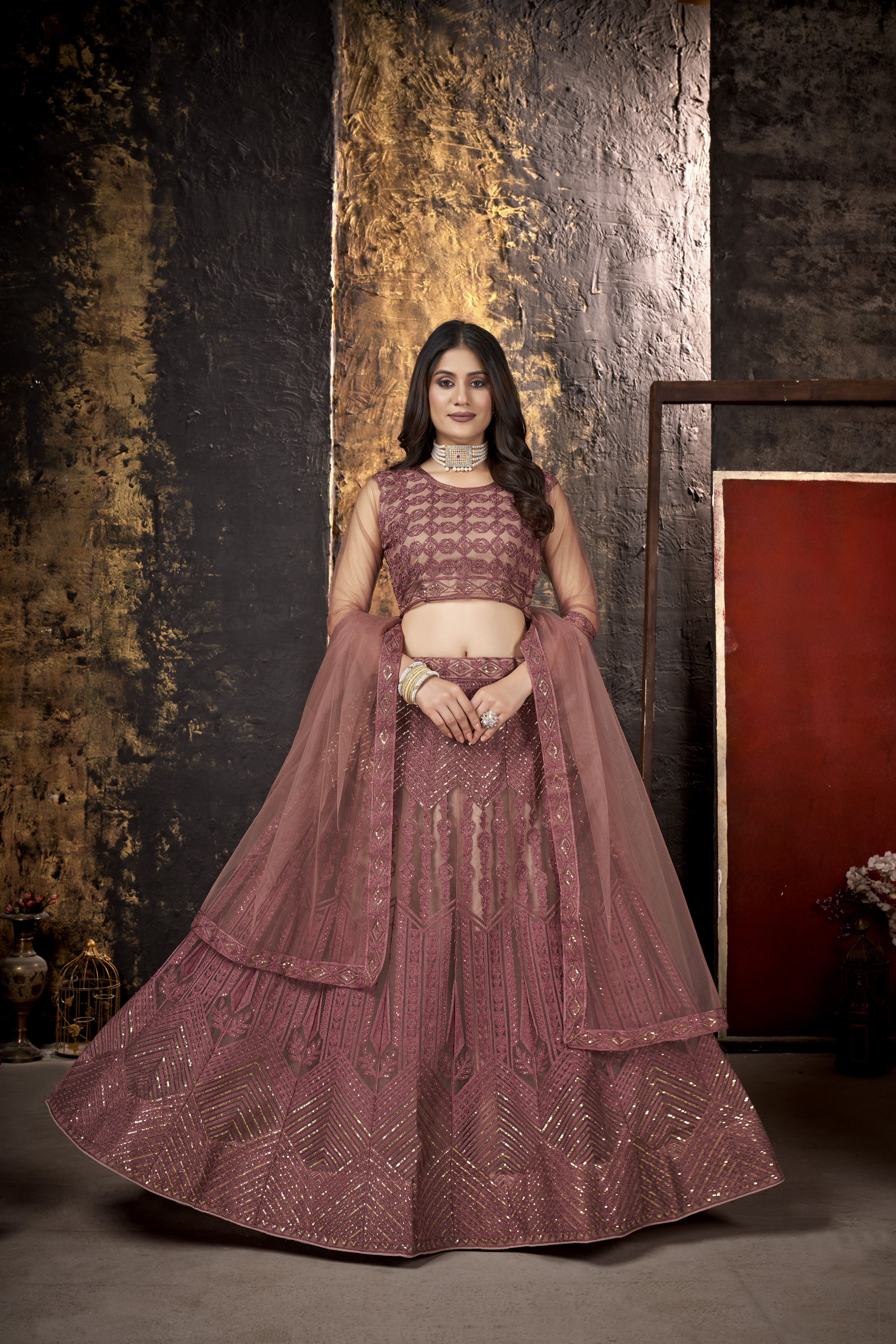 Peach Heavy Net With Sequence Embroidery Work Semi-Stitched Lehenga Choli