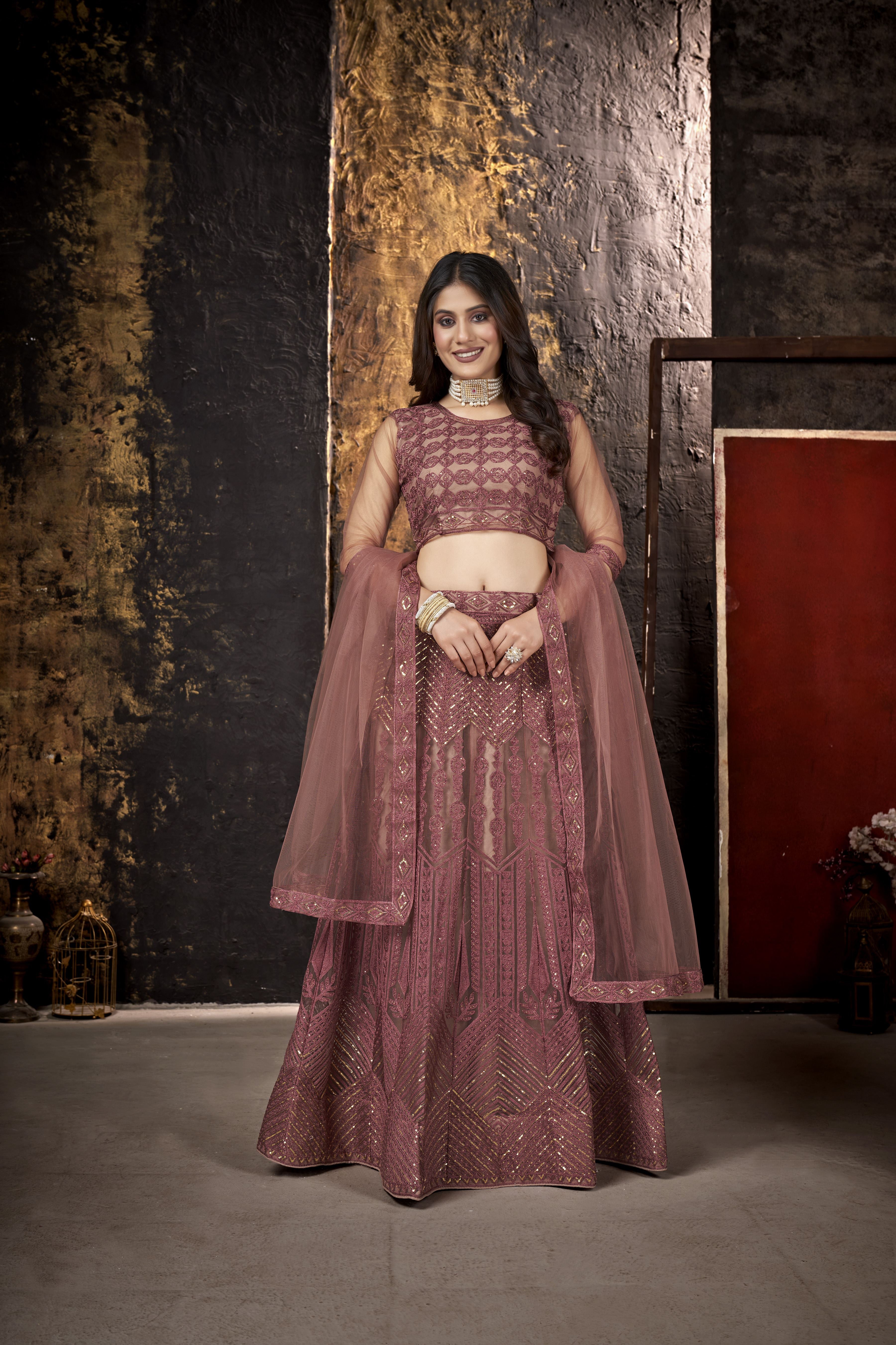 Peach Heavy Net With Sequence Embroidery Work Semi-Stitched Lehenga Choli