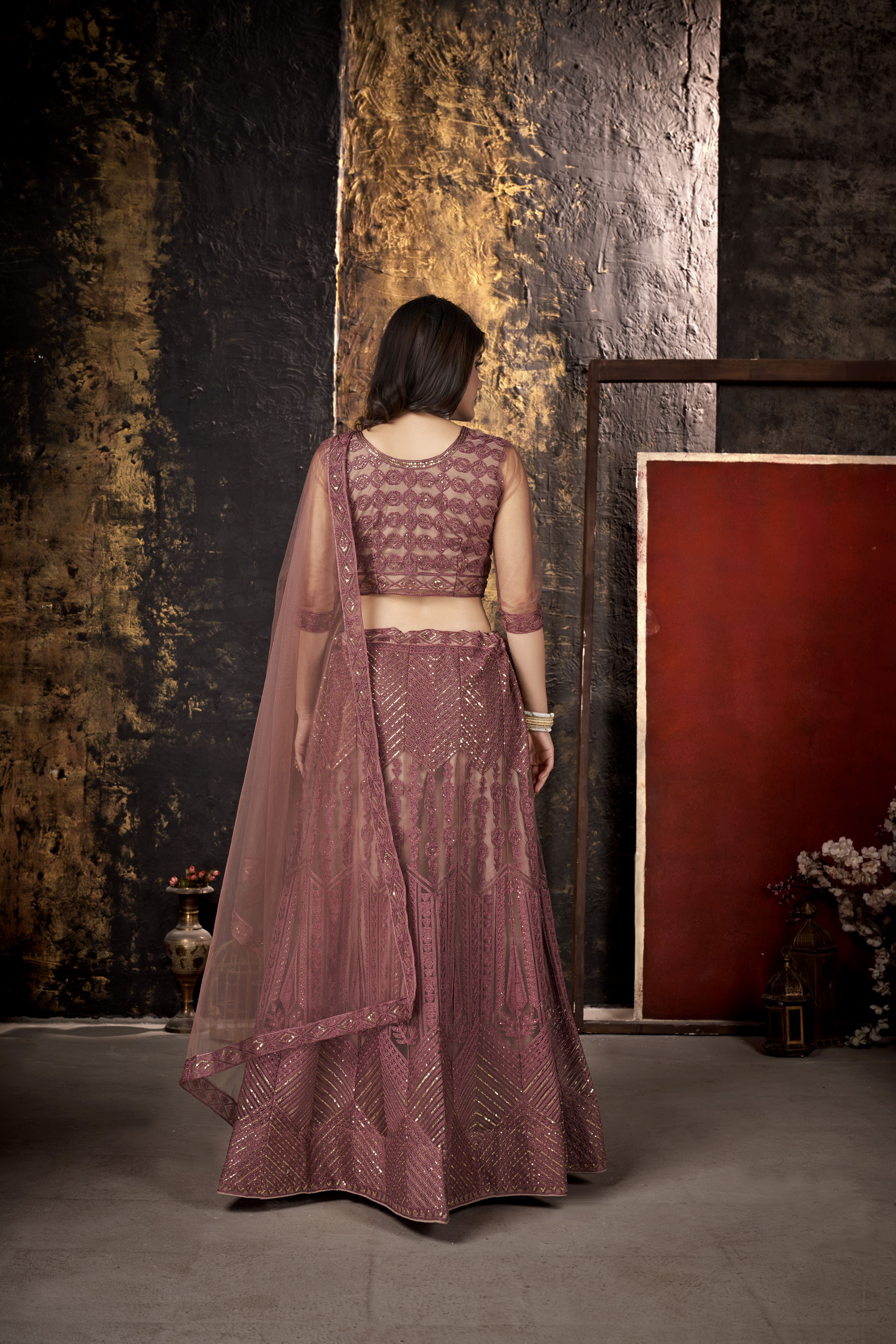 Peach Heavy Net With Sequence Embroidery Work Semi-Stitched Lehenga Choli