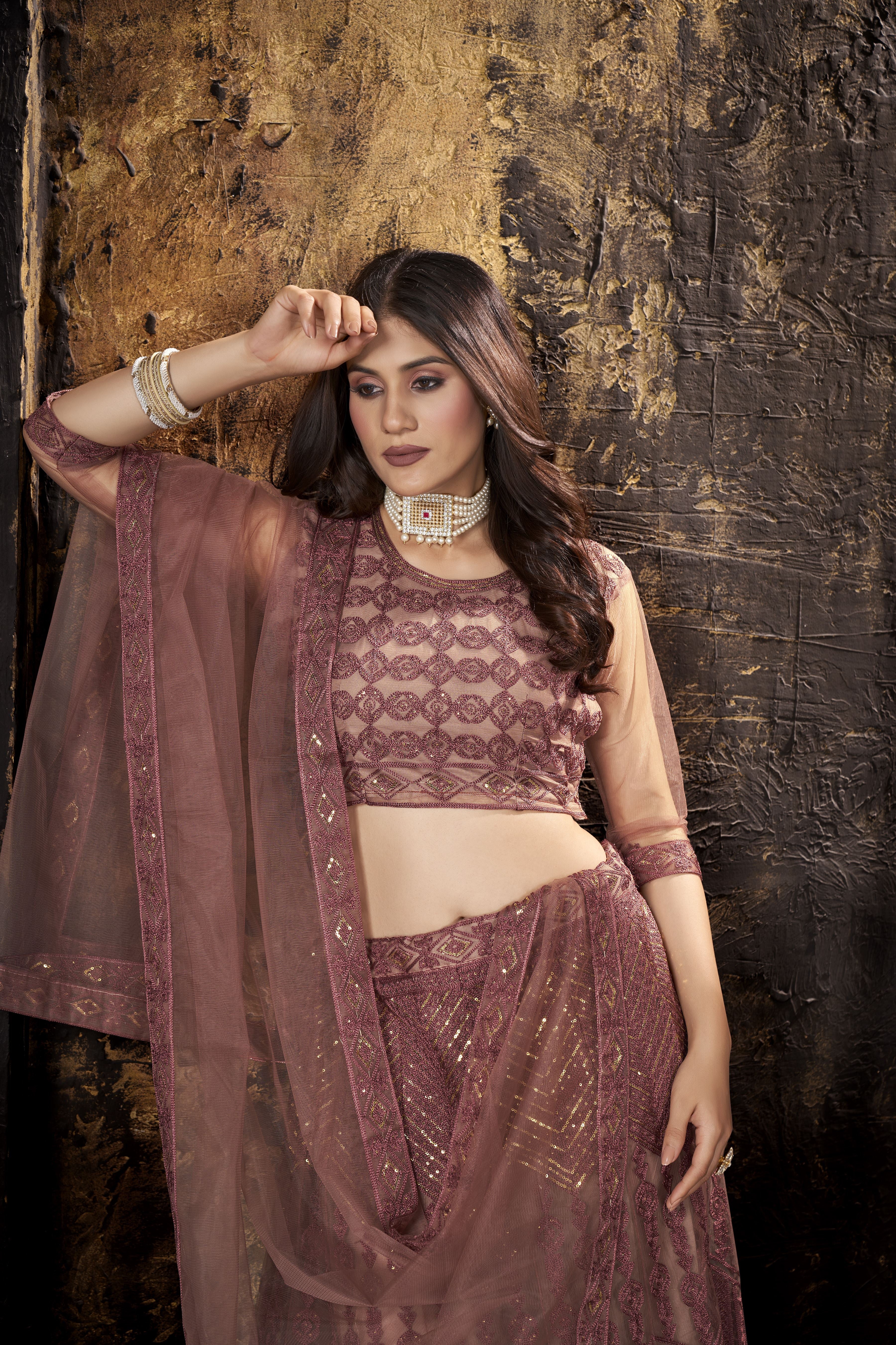Peach Heavy Net With Sequence Embroidery Work Semi-Stitched Lehenga Choli