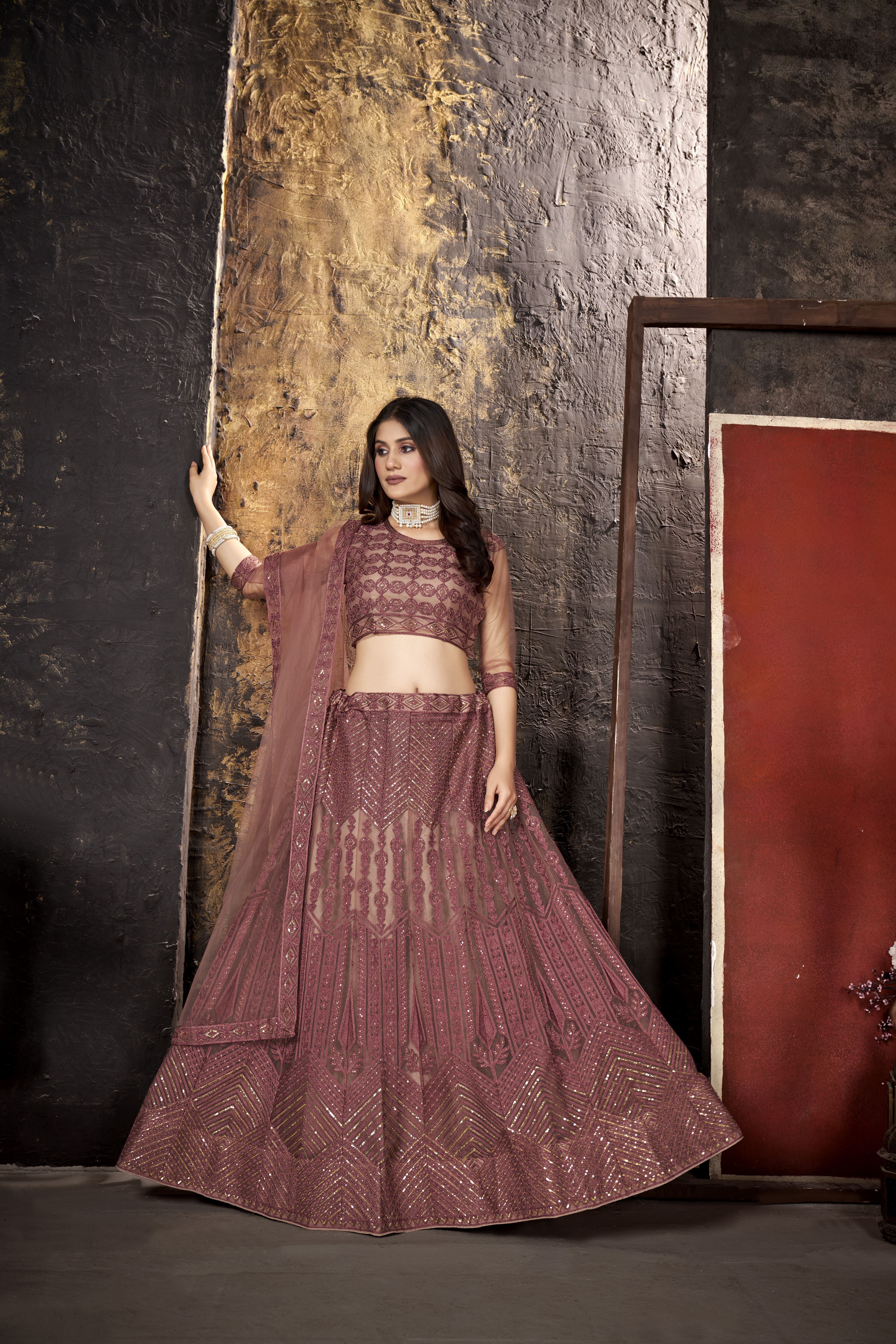 Peach Heavy Net With Sequence Embroidery Work Semi-Stitched Lehenga Choli